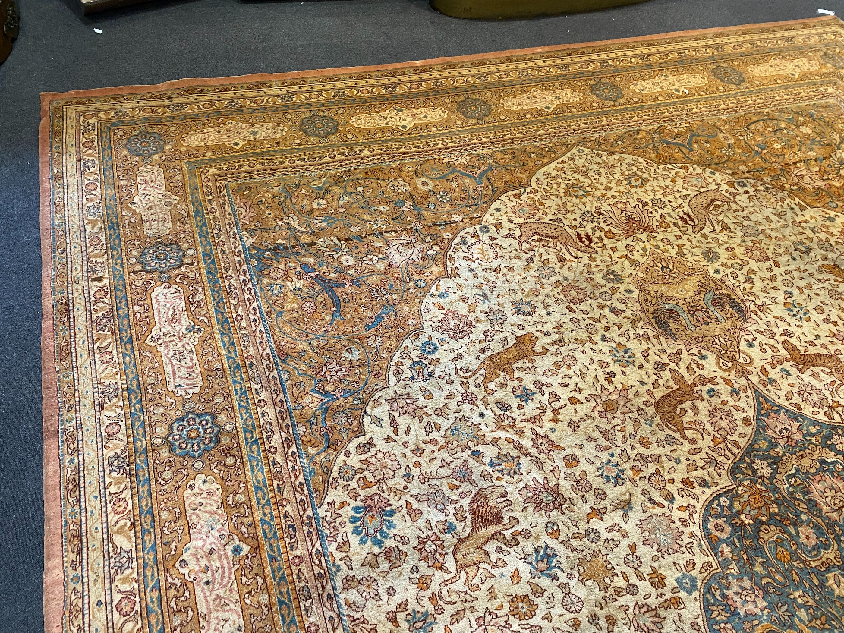 An early 20th century Tabriz ivory ground carpet, 528 x 348cm